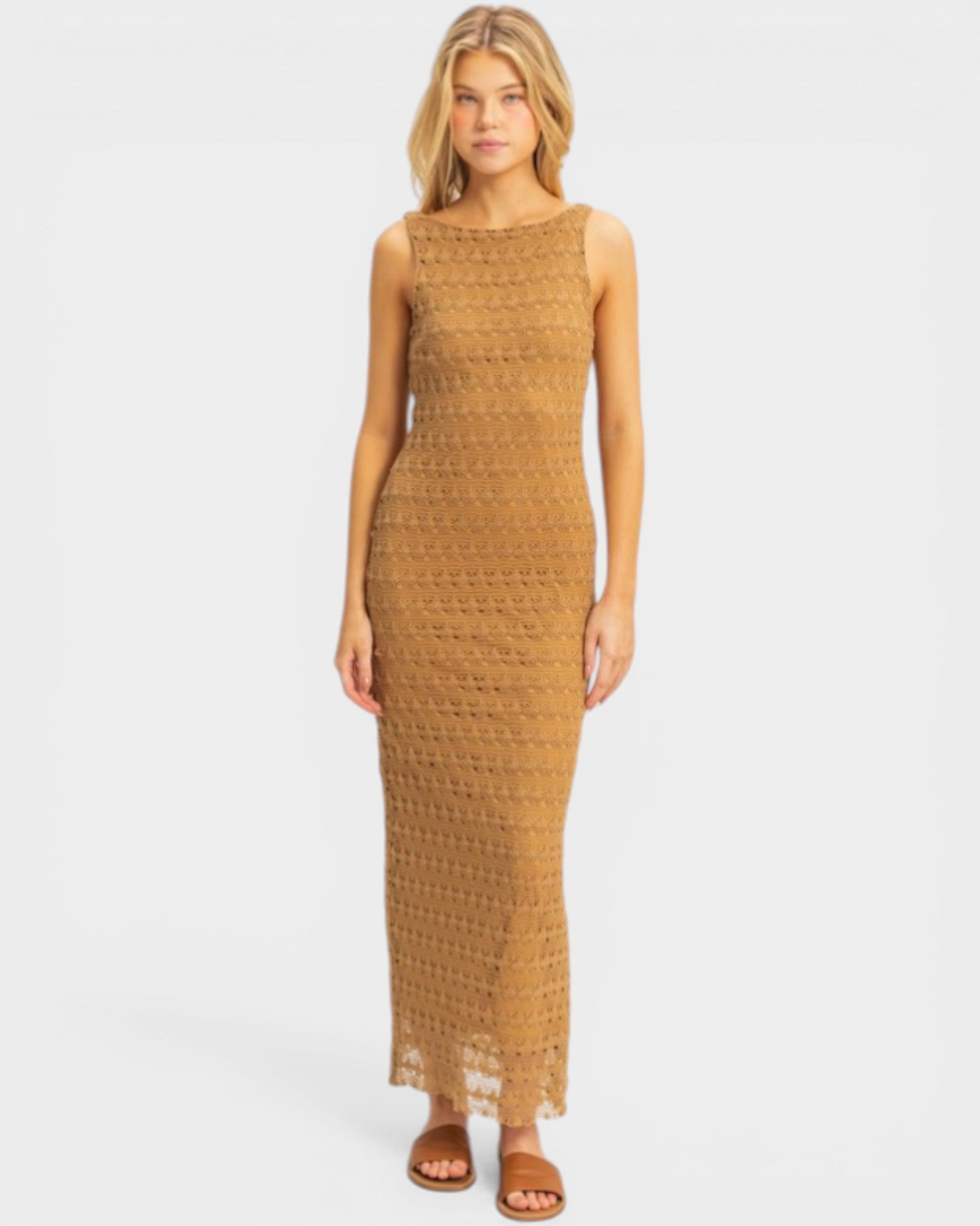 Woman wearing a brown lace dress on a white background