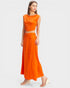 Woman wearing an orange outfit on a white background