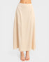 Beige skirt worn by a person on a white background