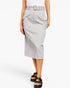 A model wearing a light gray cargo-style midi skirt with a matching belt, shown from the waist down against a plain white studio background.