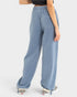 Light blue wide-leg pants worn by a person on a white background