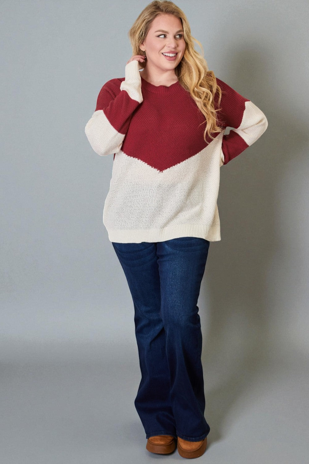 Top de punto con hombros caídos y bloques de color en rojo