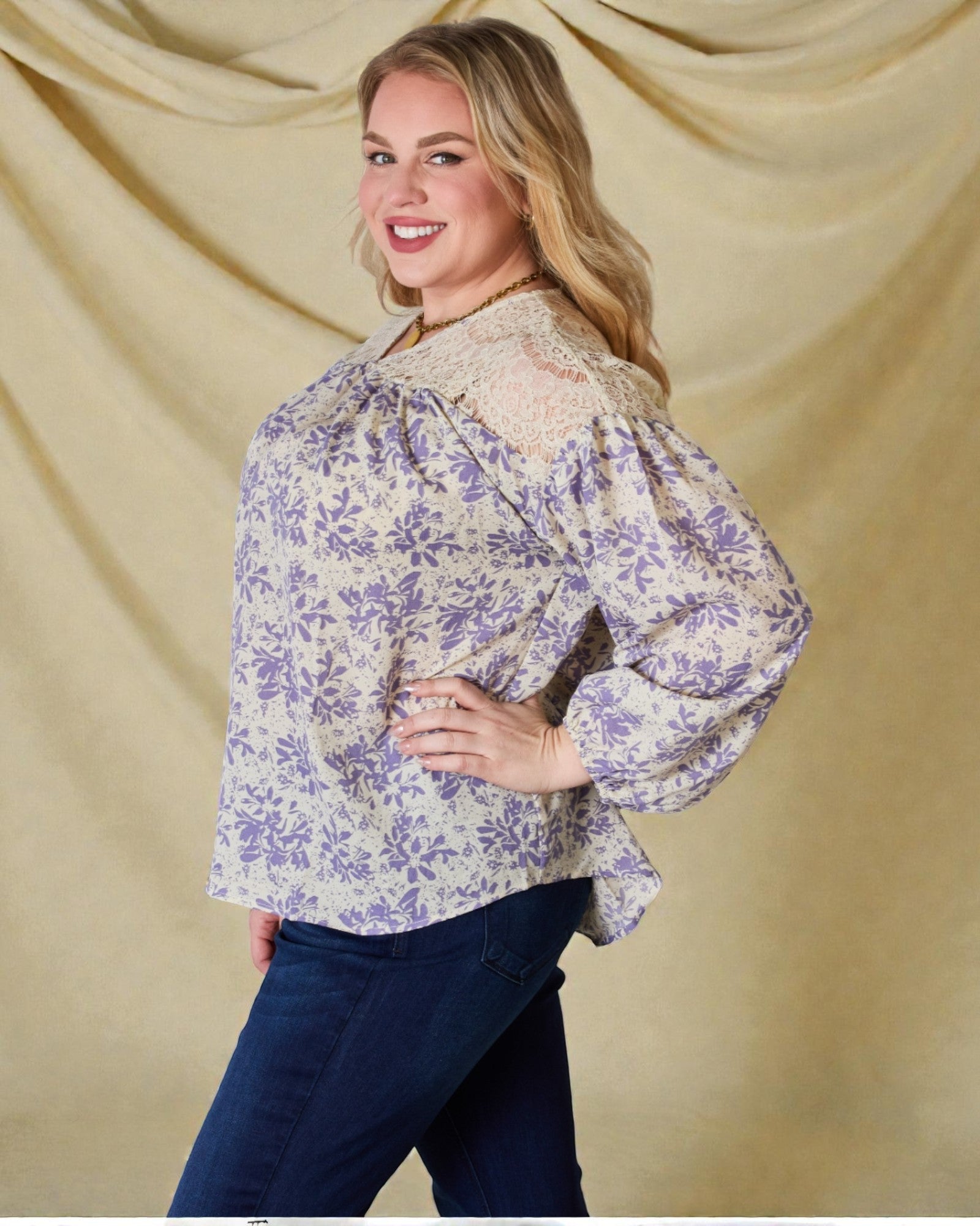 Woman wearing a floral blouse with a beige background