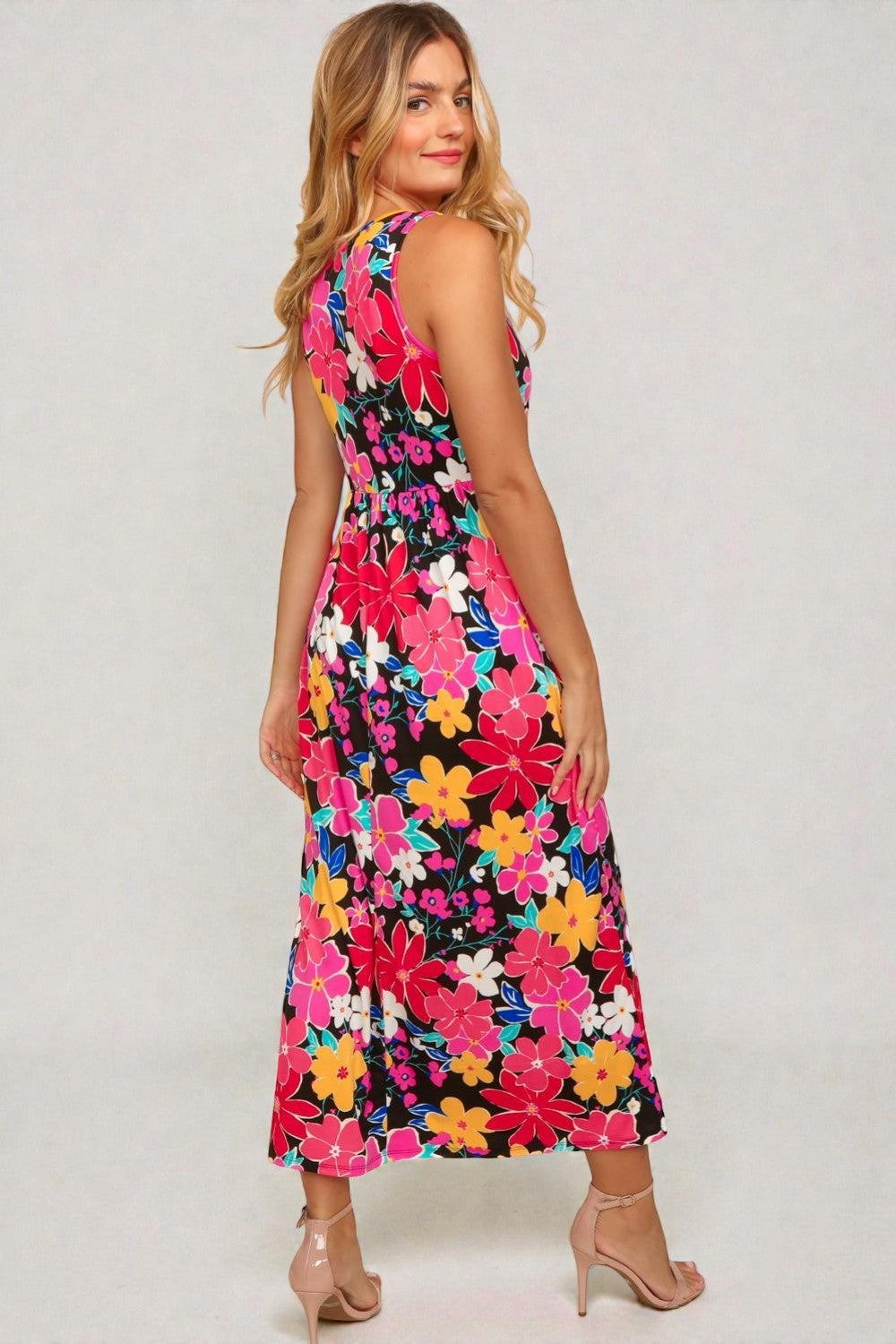Robe mi-longue sans manches à imprimé floral jaune fuchsia en noir