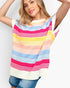 A woman wearing a colorful striped knit top with horizontal bands of pink, yellow, light blue, peach, and white, paired with blue denim shorts, against a plain light gray background.