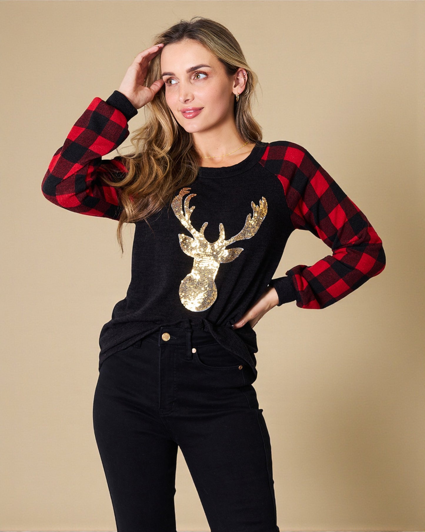 Haut à carreaux noir à motif de renne à sequins