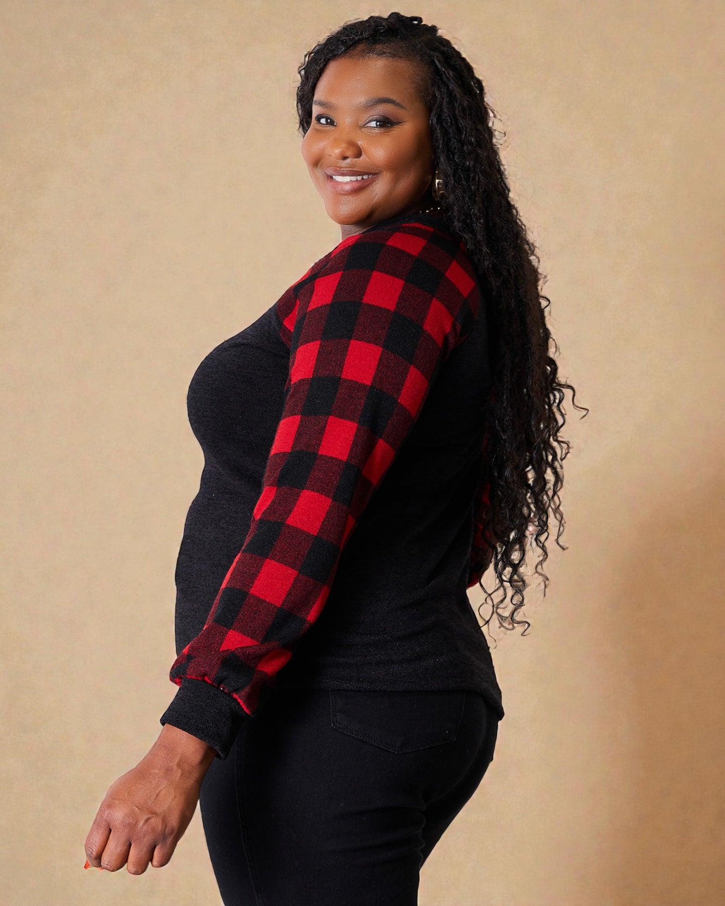 Haut à carreaux noir à motif de renne à sequins