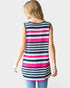 Woman wearing a sleeveless striped shirt with pink, white, and navy stripes on a plain background