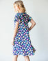Robe mi-longue à manches à volants avec poches à fleurs bleu marine