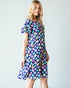 Robe mi-longue à manches à volants avec poches à fleurs bleu marine