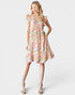 Woman wearing a floral dress on a white background