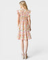 Woman wearing a floral dress on a white background