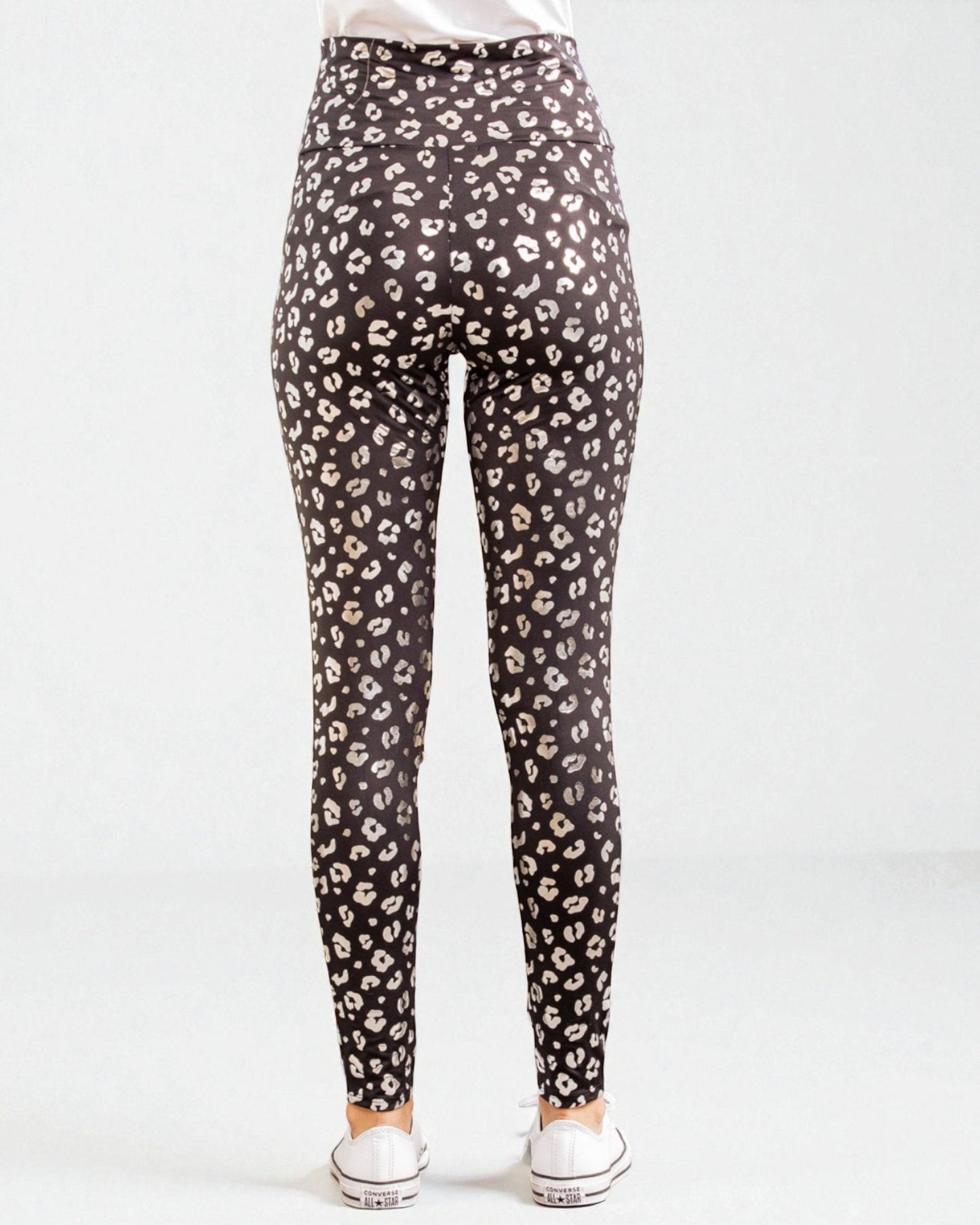 Leopard print leggings on a white background