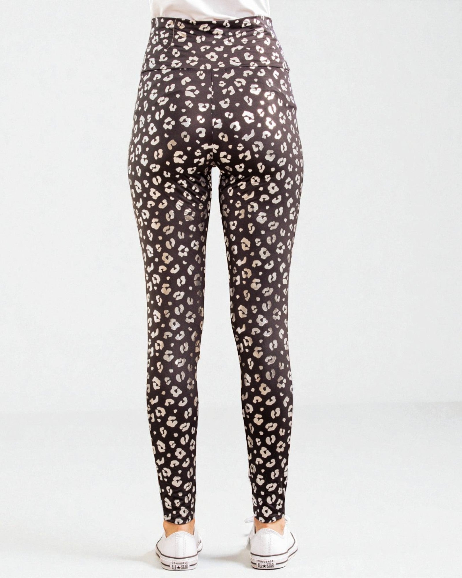 Leopard print leggings on a white background