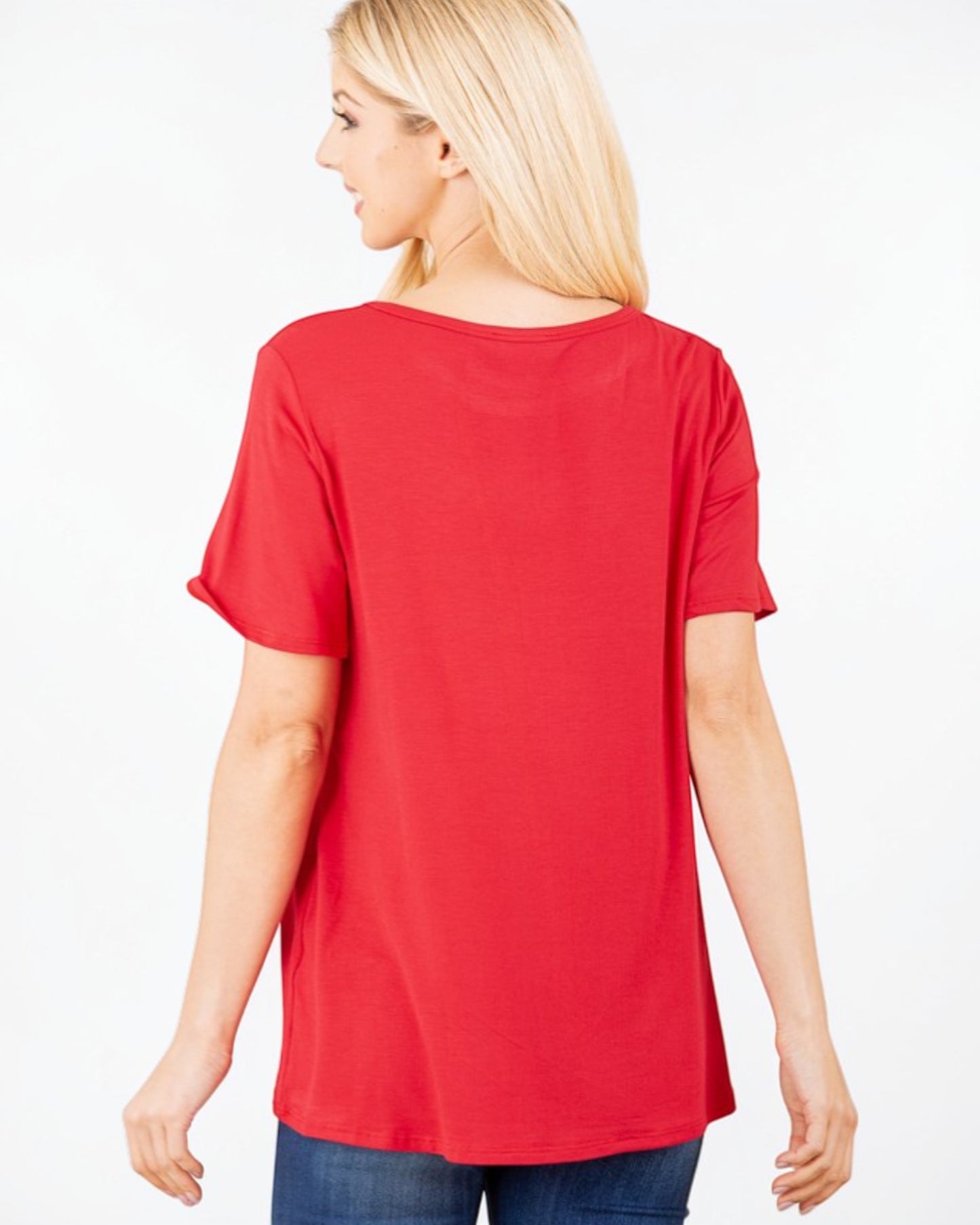 Woman wearing a red t-shirt on a white background