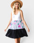 Vestido corto sin mangas con escote redondo y volantes en capas en color marfil