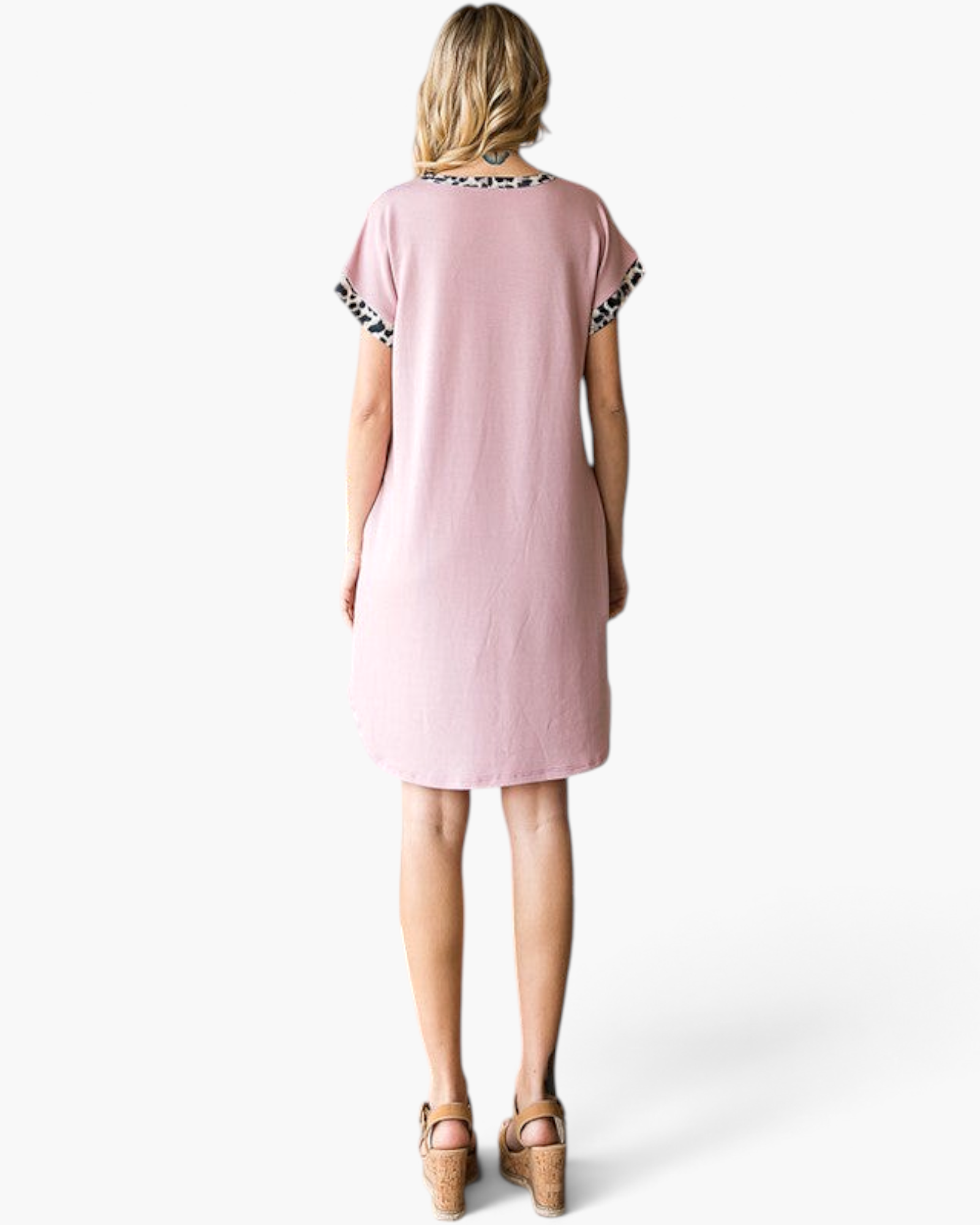 Beach Rose Co. dusty pink t-shirt dress with leopard print sleeve trim and rounded hem seen from the back