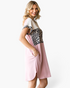 Beach Rose Co. dusty pink and leopard print color-block T-shirt dress with side pockets on a smiling model