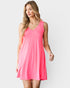 Woman wearing a pink dress on a white background