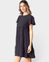 Vestido corto con mangas cortas y diseño escalonado de lunares suizos en color negro