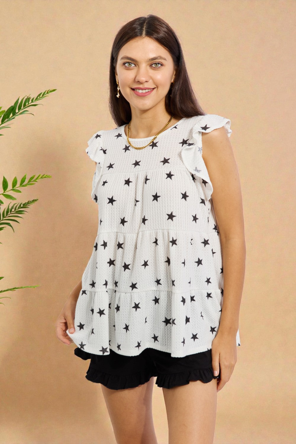 Haut babydoll à manches papillon et imprimé étoiles en blanc