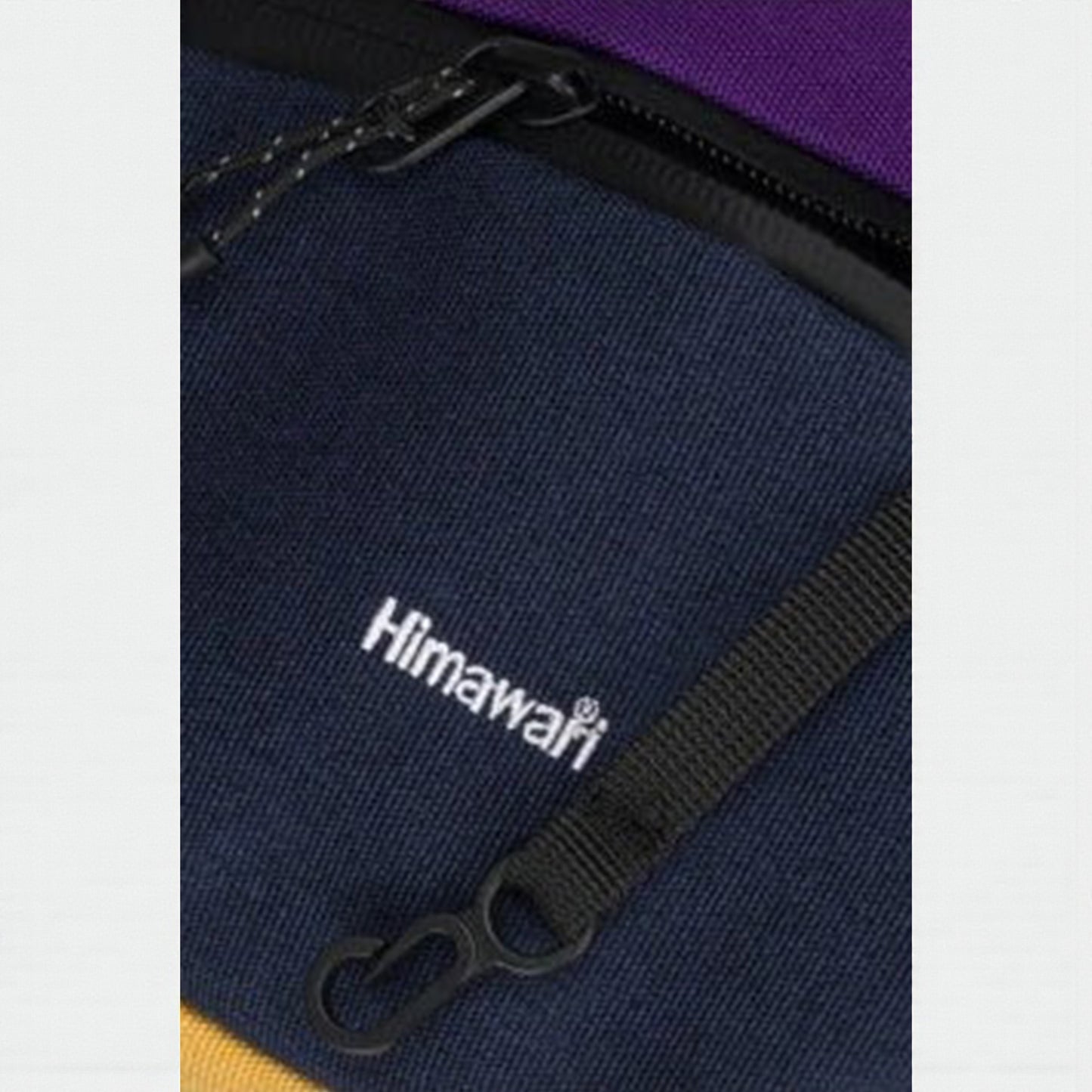 Navy blue bag with 'Himawari' branding and black zipper.