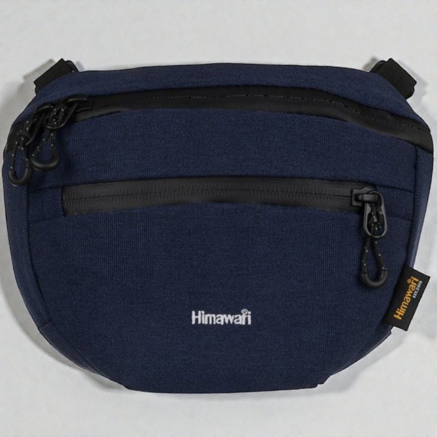 Navy blue waist bag with black zippers and 'Himawari' branding on a white background