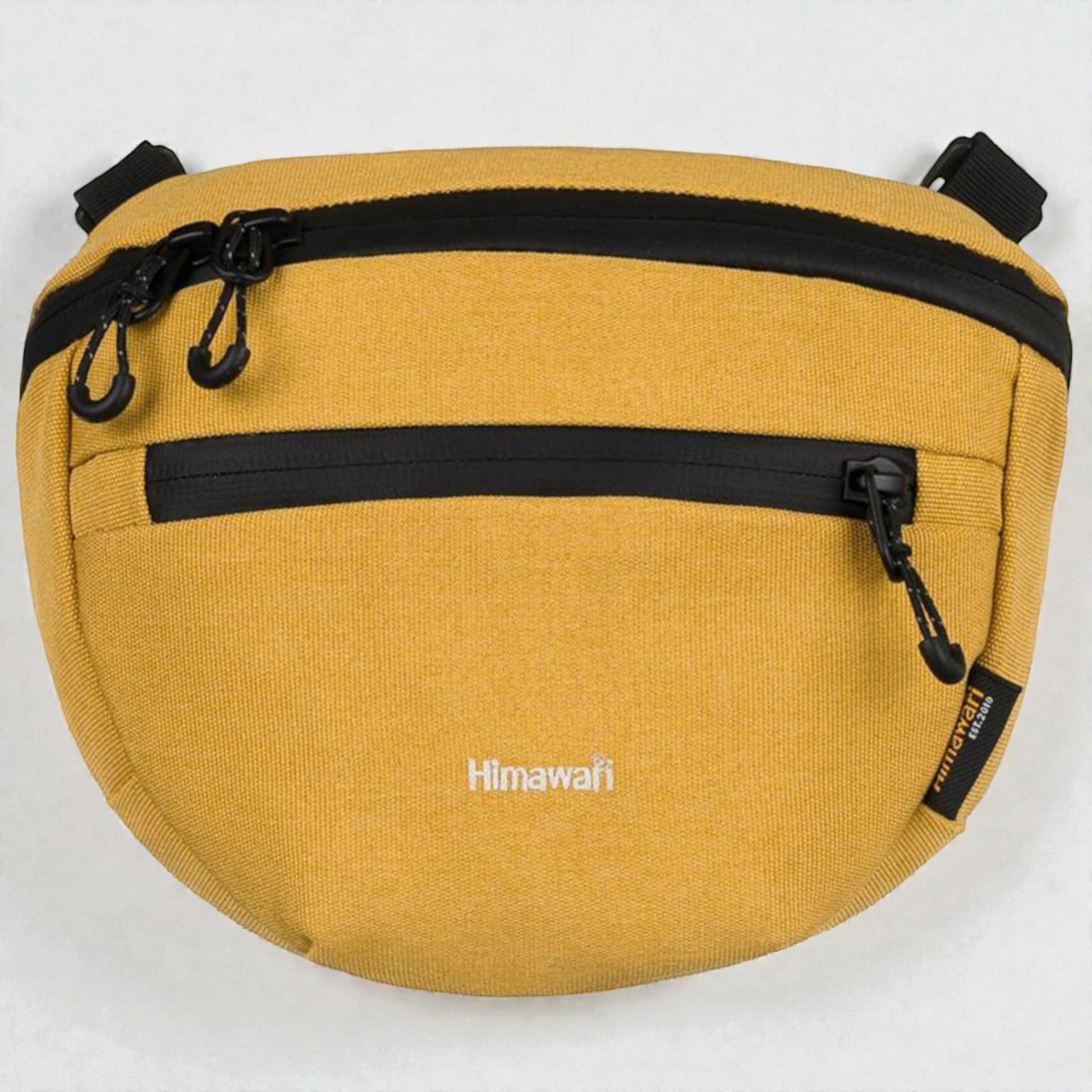 Yellow waist bag with black zippers and 'Himawari' branding on a white background