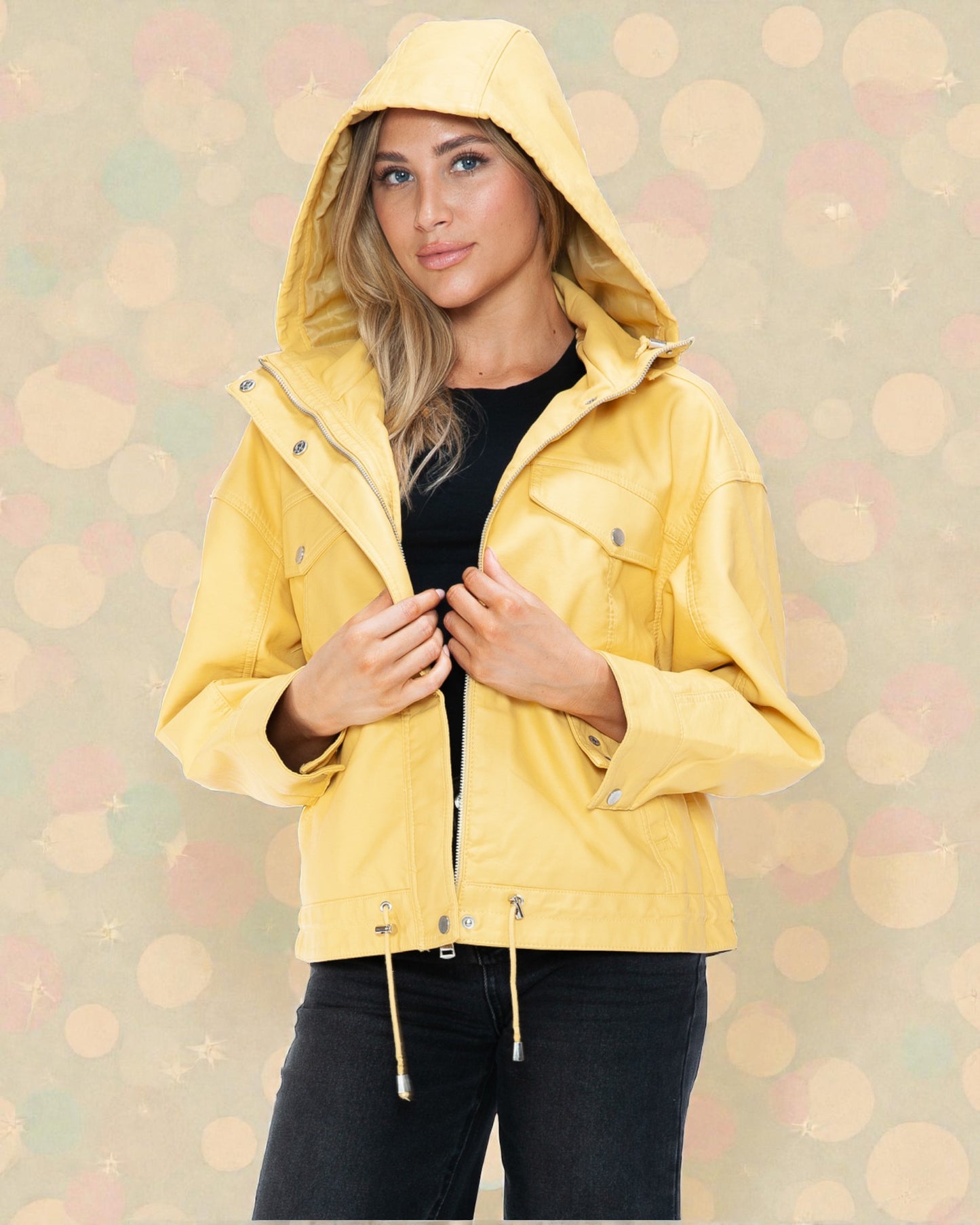 Woman wearing a yellow raincoat against a bokeh background