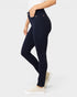 Person wearing navy blue jeans on a white background