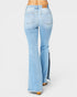 Light blue flared jeans on a white background