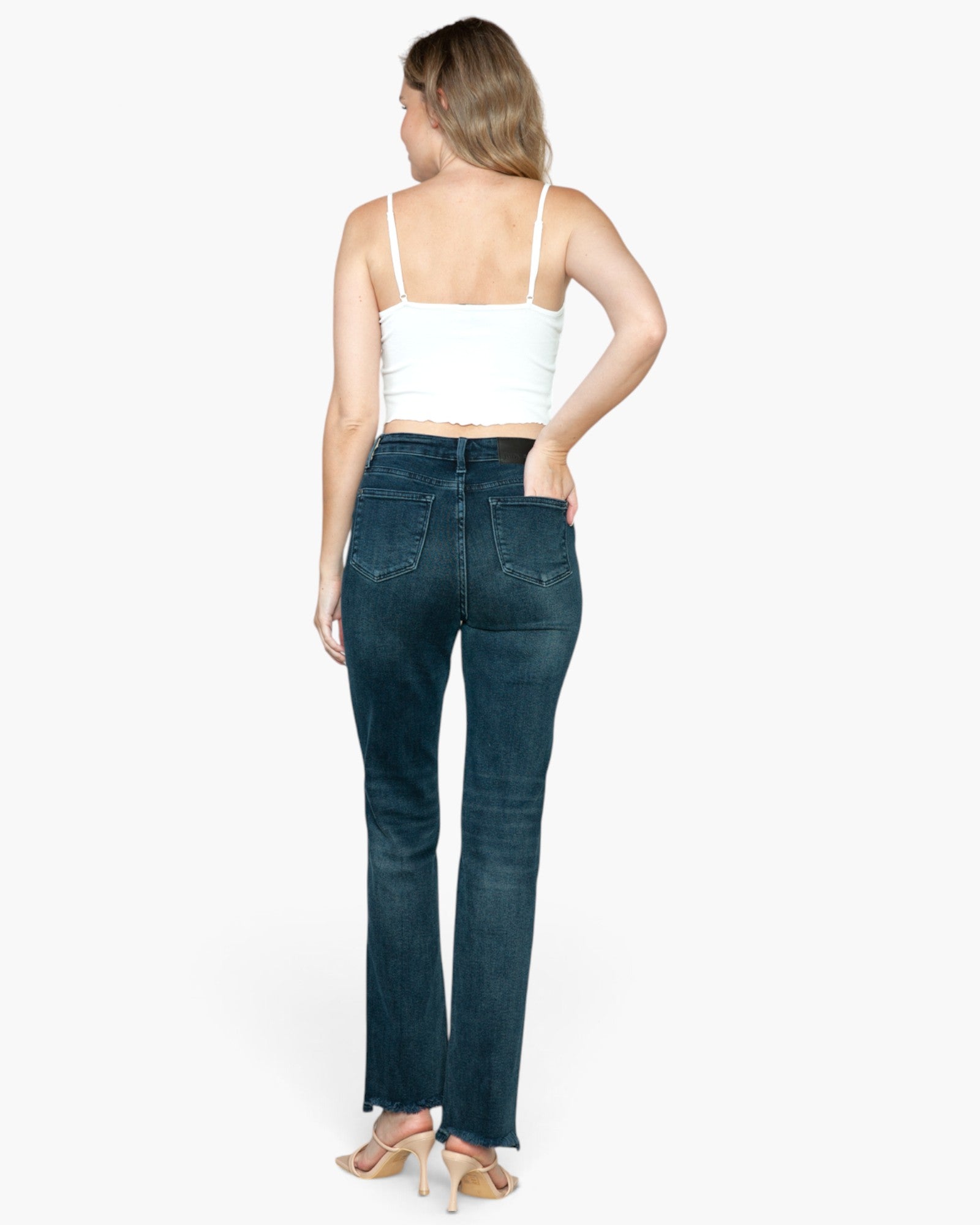 Vaqueros de pierna recta con dobladillo sin rematar y bragueta con botones y lavado oscuro