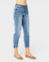 Light blue jeans worn by a person on a white background