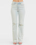 Light blue jeans with slight distressing on a white background
