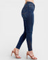 Blue jeans with decorative stitching on a white background