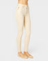 Beige jeans worn by a person on a white background