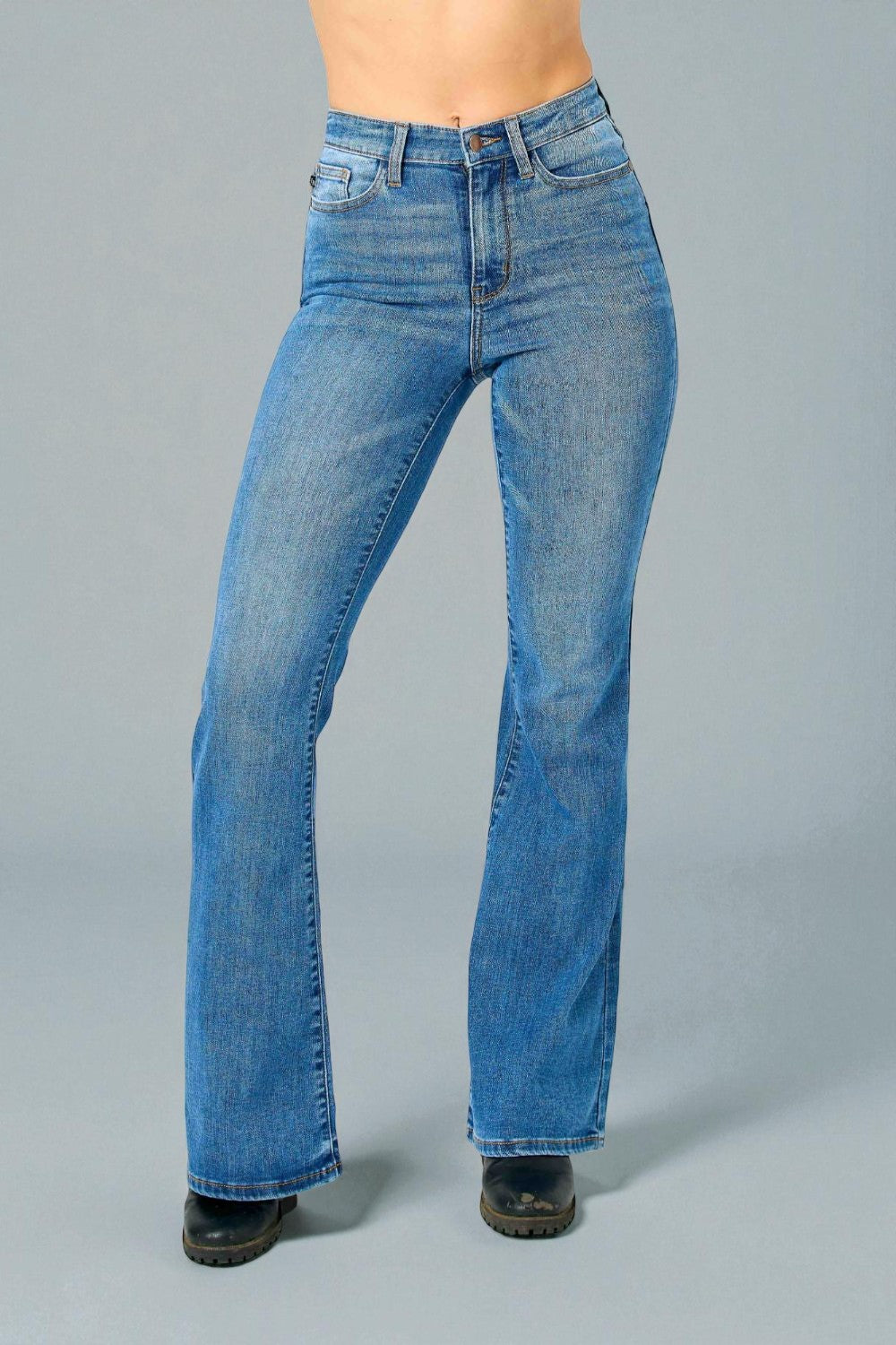 Blue jeans on a gray background