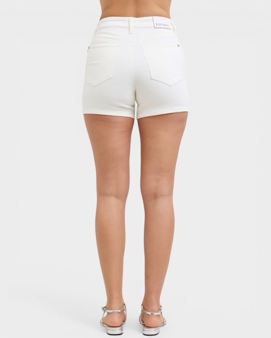 White shorts worn by a person on a white background