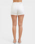 White shorts worn by a person on a white background