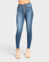 Blue jeans with button details on a white background