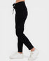 Black cargo jogger pants worn by a person on a white background