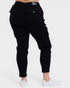 Black cargo pants worn by a person on a white background