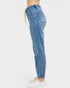Blue jeans worn by a person on a white background