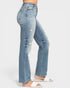 Light blue jeans worn by a person on a white background
