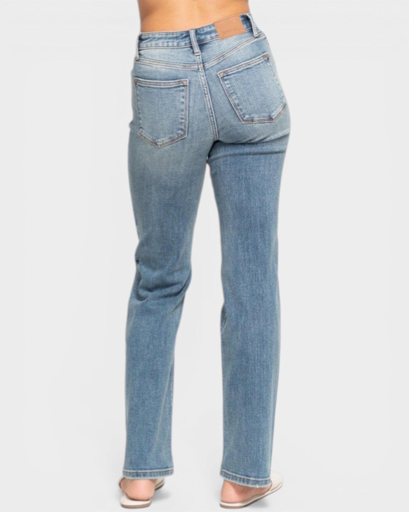 Light blue jeans on a white background