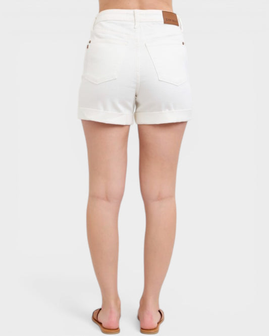 White shorts worn by a person on a white background