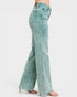 Light blue jeans worn by a person on a white background