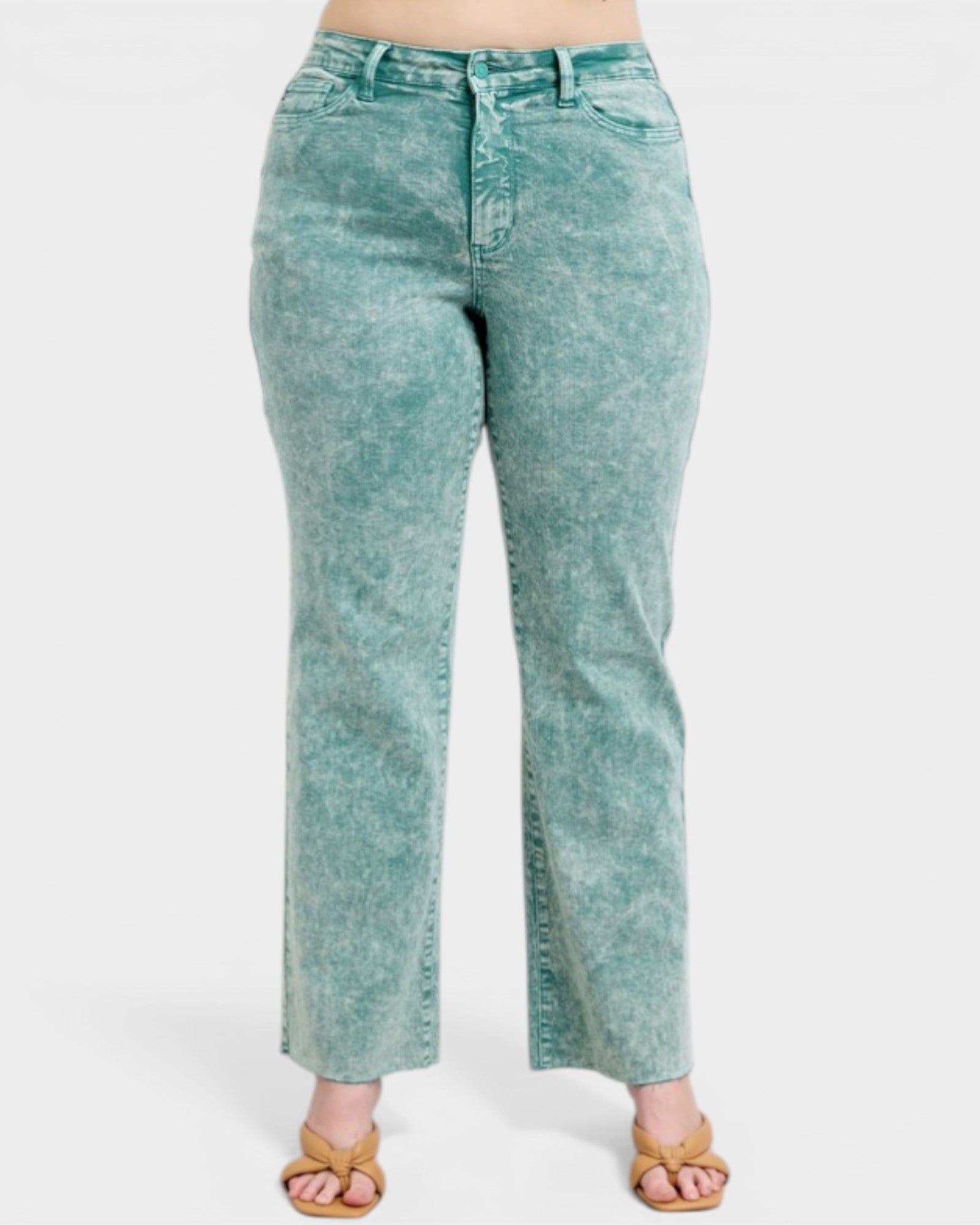 Teal acid-wash jeans on a white background