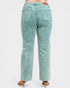 Teal acid-wash jeans on a white background