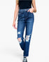 A model wearing a pair of dark blue distressed denim jeans with ripped details on the thighs and knees, paired with a black top and black sneakers, against a plain white background.
